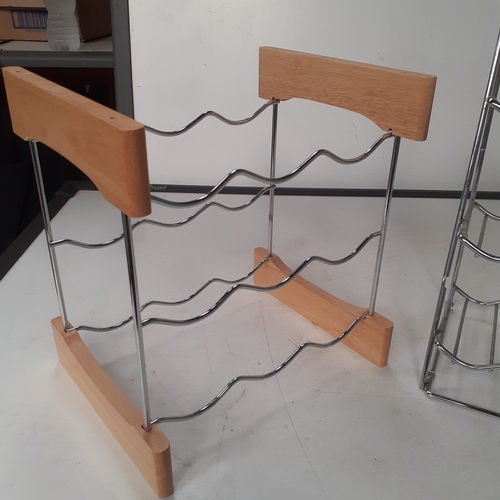 25 - 2 x stainless steel wine racks. Overall good condition
