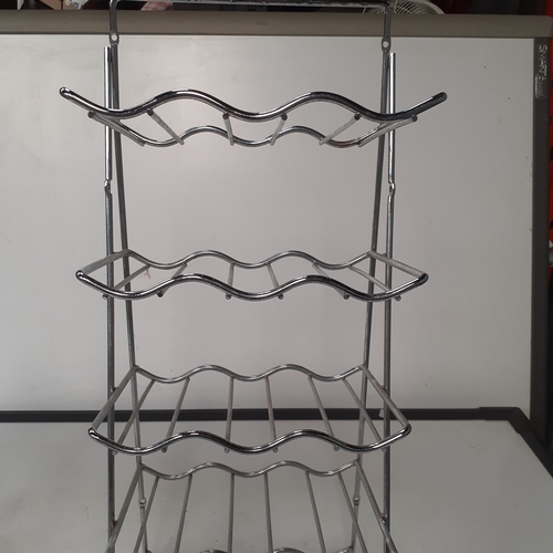 25 - 2 x stainless steel wine racks. Overall good condition