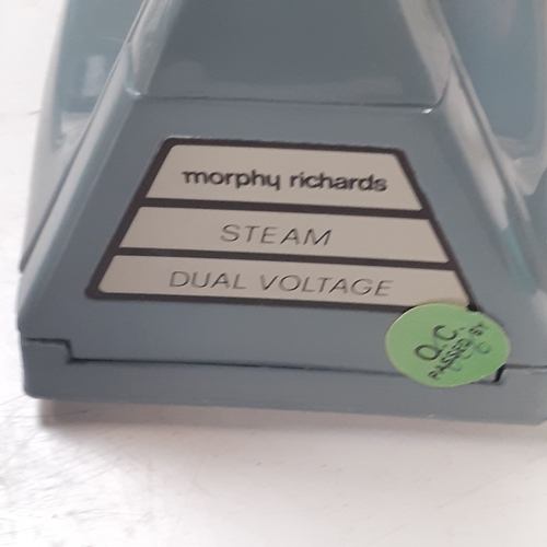 12 - 2 x travel irons. Philips Stewardess and Morphy Richards Voyager. Both with carrying bags, good cond... 