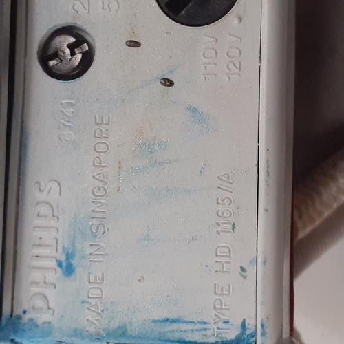 12 - 2 x travel irons. Philips Stewardess and Morphy Richards Voyager. Both with carrying bags, good cond... 