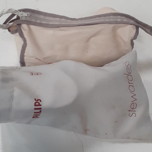 12 - 2 x travel irons. Philips Stewardess and Morphy Richards Voyager. Both with carrying bags, good cond... 