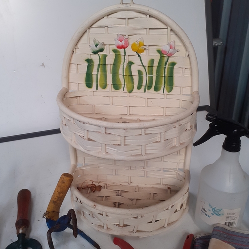 18 - Gardening lot. Includes several pairs of secateurs, tools, a wicker type planter, quantity of sandpa... 