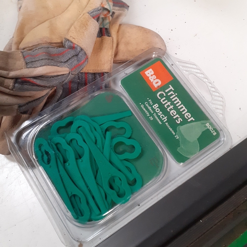 18 - Gardening lot. Includes several pairs of secateurs, tools, a wicker type planter, quantity of sandpa... 