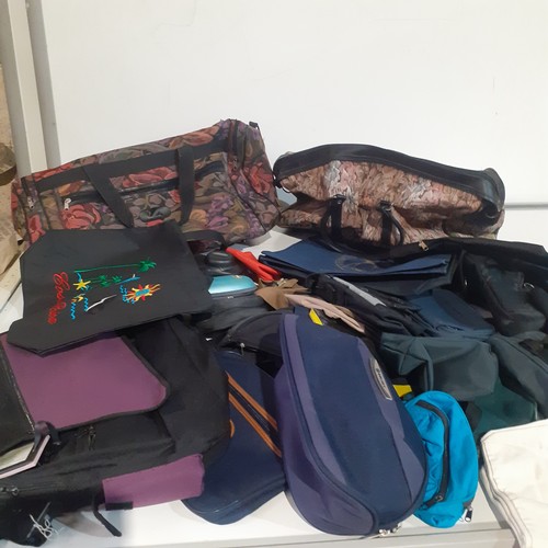 32 - Quantity of travel type bags and hand cases. Various designs and good clean condition with all zips ... 