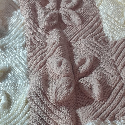 3 - 2 x hand knitted blankets. One has quilted back and the other beige and white pattern with raised de... 