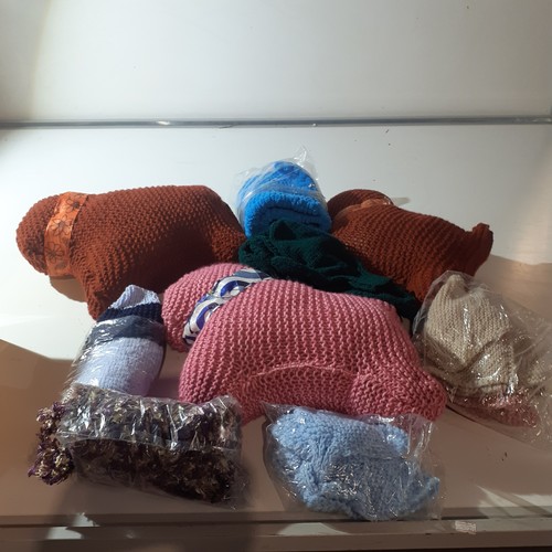 10 - A collection of hand knitted items, 3 dog shaped and some odds and ends. Nice clean condition