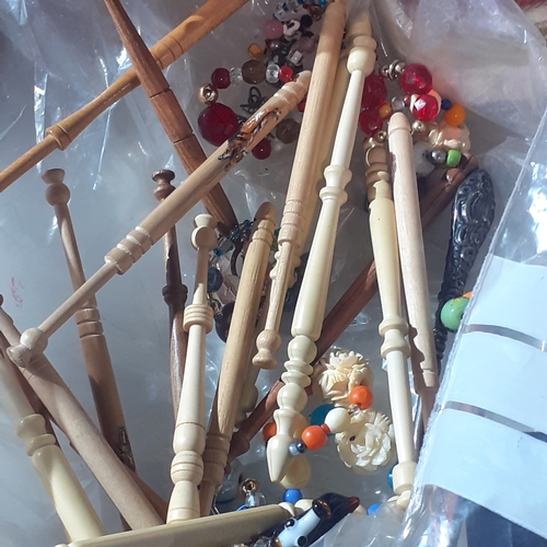 28 - Large crafting lot,  including lace bobbins, buttons, cottons, fabrics, helping hands cutting aids, ... 