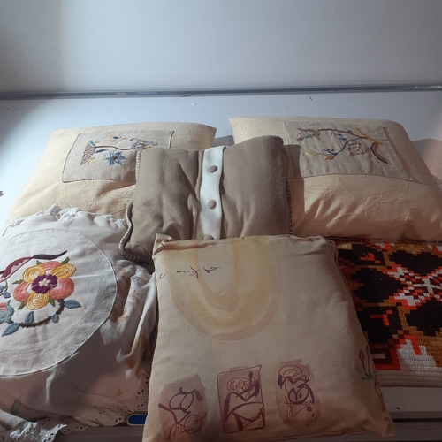 24 - Quantity of cushions. Vintage types, some with detailed embroidery patterns. Overall good condition.... 