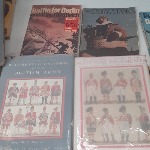 31 - A large quantity of war and forces related books. Some well known sought after reading material, bot... 