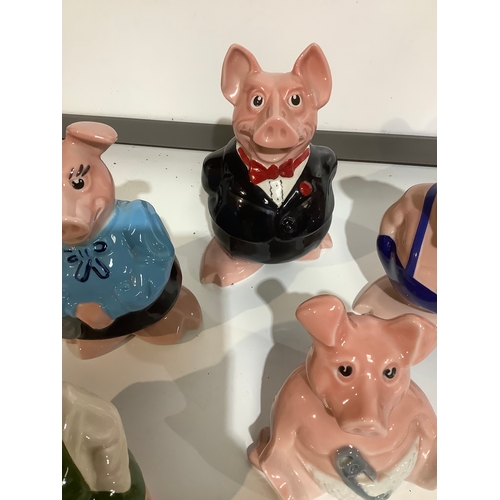 276 - Collection of NatWest wade pig money boxes