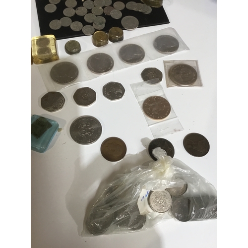 70A - Quantity of sixpences, shillings some crowns old pennies and fifty pence pieces plus more some set i... 