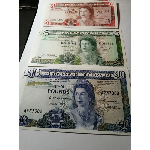31A - COINS : GIBRALTAR 1 pound note(x3), 5 pounds note and a ten pounds note All dated 1975