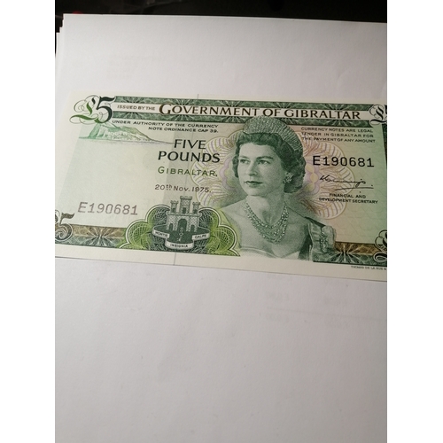 31A - COINS : GIBRALTAR 1 pound note(x3), 5 pounds note and a ten pounds note All dated 1975
