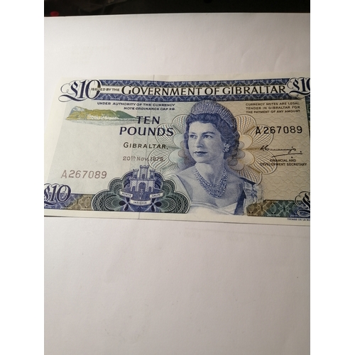 31A - COINS : GIBRALTAR 1 pound note(x3), 5 pounds note and a ten pounds note All dated 1975