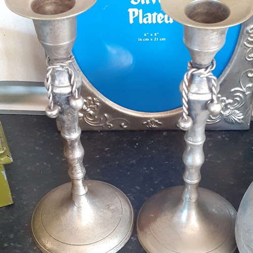 6 - A very interesting mixed metal lot. Includes pair of candlesticks with decorative knot design, a hor... 