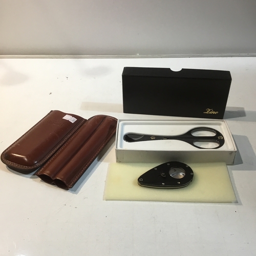 18 - Xikar & Zino cigar cutters plus Pheasant tan cigar case