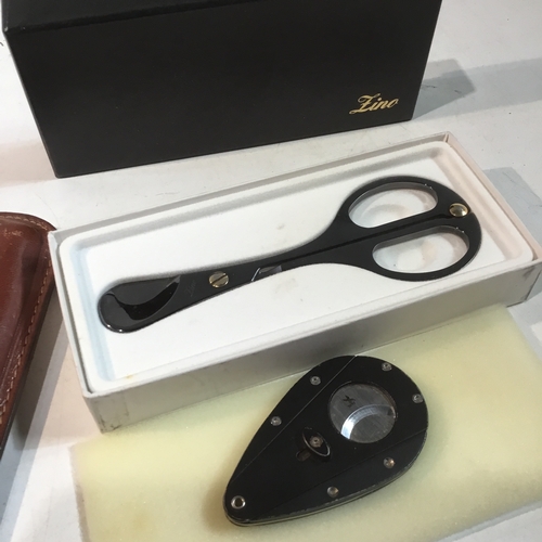 18 - Xikar & Zino cigar cutters plus Pheasant tan cigar case