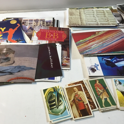 44 - Large collection of different postcards & tea cards