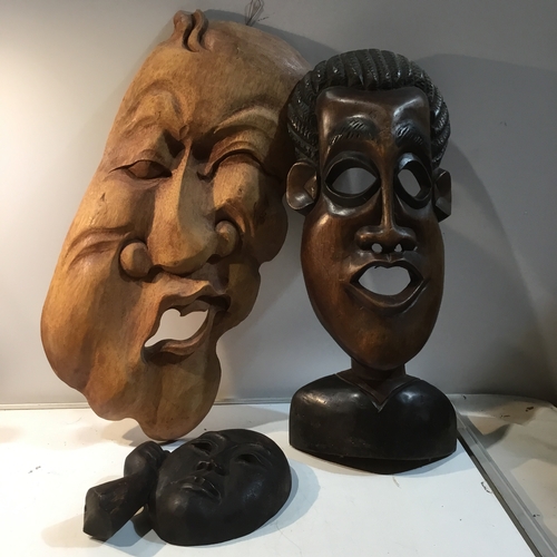 73 - Collection of wooden masks