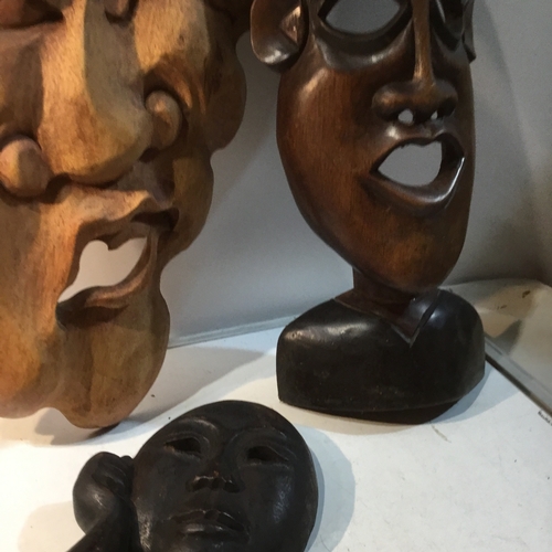 73 - Collection of wooden masks