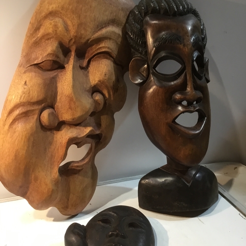 73 - Collection of wooden masks