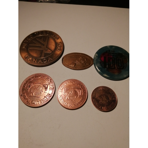 21A - A collection of tokens including Ironbridge Forge penny, halfpenny and farthing