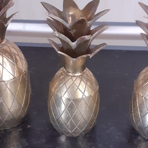 1 - Three small brass pineapple trinket pots. Lidded, with 2 same size and one slightly bigger, these ha... 