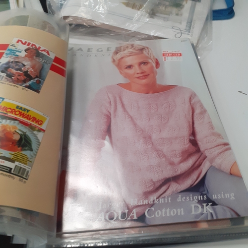 28 - Large selection of knitting patterns in folders. Well kept in categories, including Aran, cable, dol... 