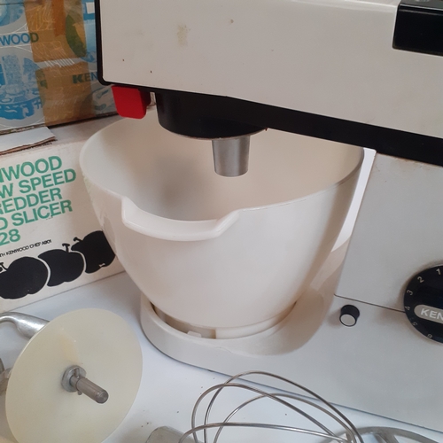 11 - Kenwood food mixer. Model A901. Has multiple attachments, shown in pictures. Most are boxed and in v... 