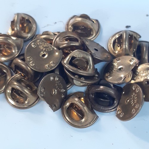 36 - Quantity of metal number pin badges used for Police shoulder numbers. With pins. Random numbers in g... 