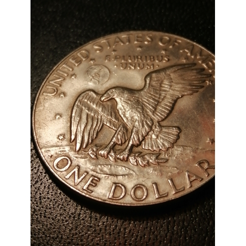 22A - USA 1977 Dollar in about mint condition