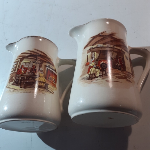 Pair water jugs. Kitchen scenes with ladies at spinning wheels. Stamped