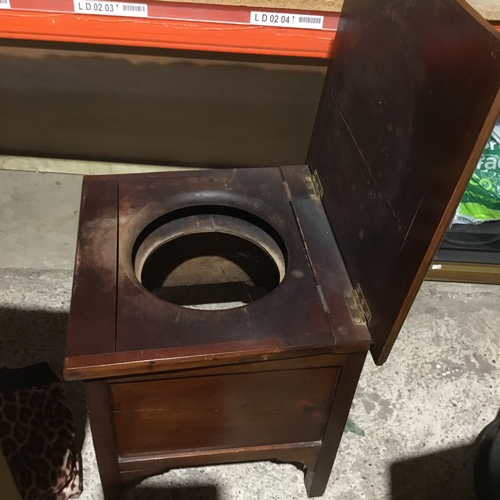 20 - Antique oak cased commode chair