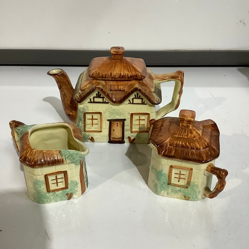 274 - Cottage ware teapot sugar bowl & milk jug