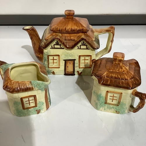 274 - Cottage ware teapot sugar bowl & milk jug