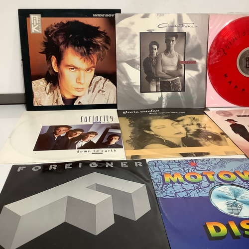 294 - Box of 12” singles includes pointer sisters pet shop boys foreigner and many more