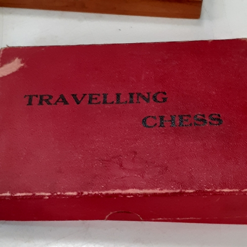 40 - A compendium of dice and card games as new with travelling chess sets in vintage condition but compl... 