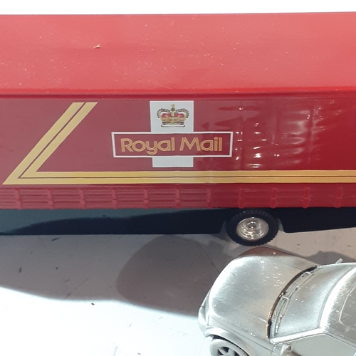 2 - Diecast collectible Royal mail Corgi, a Days gone model and a metal Discovery 3 Launch edition Landr... 