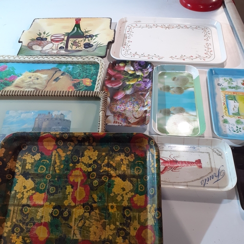 33 - Quantity of trays. Mostly melamine or plastic with one porcelain.  Nice condition with no damage. Di... 