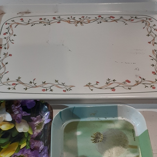 33 - Quantity of trays. Mostly melamine or plastic with one porcelain.  Nice condition with no damage. Di... 