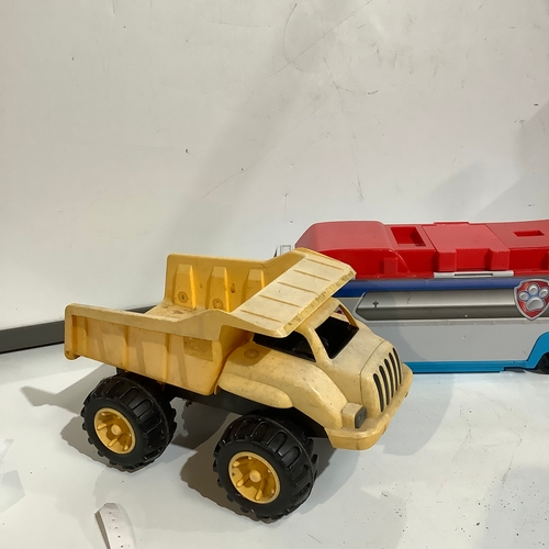 327 - To moulded plastic toy vehicles, one in the shape of Dumper truck and one car transporter. Car trans... 