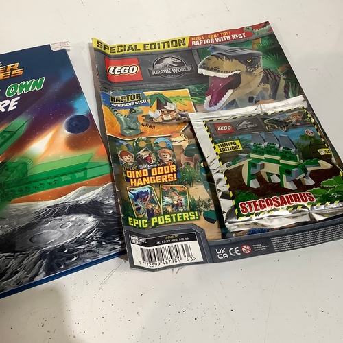 329 - Lego magazine and superheroes build your own adventure manual. Magazine includes limited edition din... 