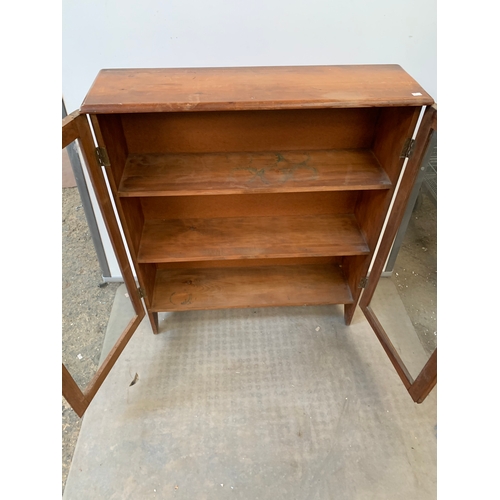 212 - Oak glazed bookcase in nice condition