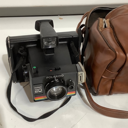 333 - Polaroid instant 20 vintage camera in an original Brown leather Polaroid case. Untested