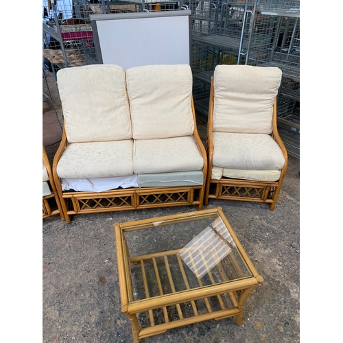 297 - Cane effect conservatory set with double seater sofa, 2 armchairs & glass topped table