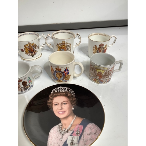 338 - Collection of Royal related mugs and plate. Featuring celebrations from 1953, 1977 and more.