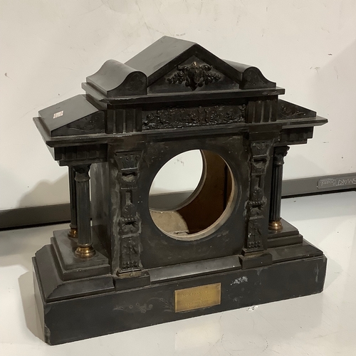 345 - Antique mental clock surround. Very heavy made of marble possibly metal with a plaque presented to a... 