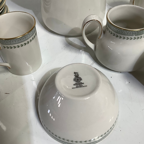 348 - Royal Dalton fine China coffee pot with a company in cups saucers and sugar bowl.