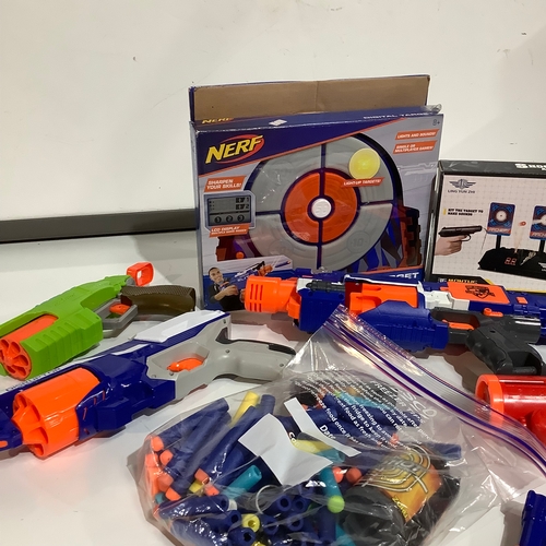 349 - A quantity of Nerf guns. Two boxed including shoot at target and digital target. Overall good condit... 