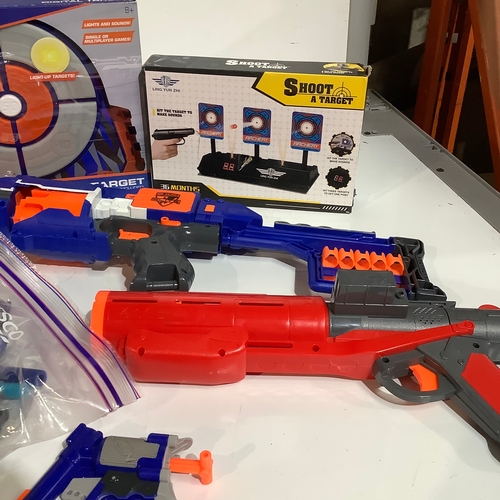 349 - A quantity of Nerf guns. Two boxed including shoot at target and digital target. Overall good condit... 